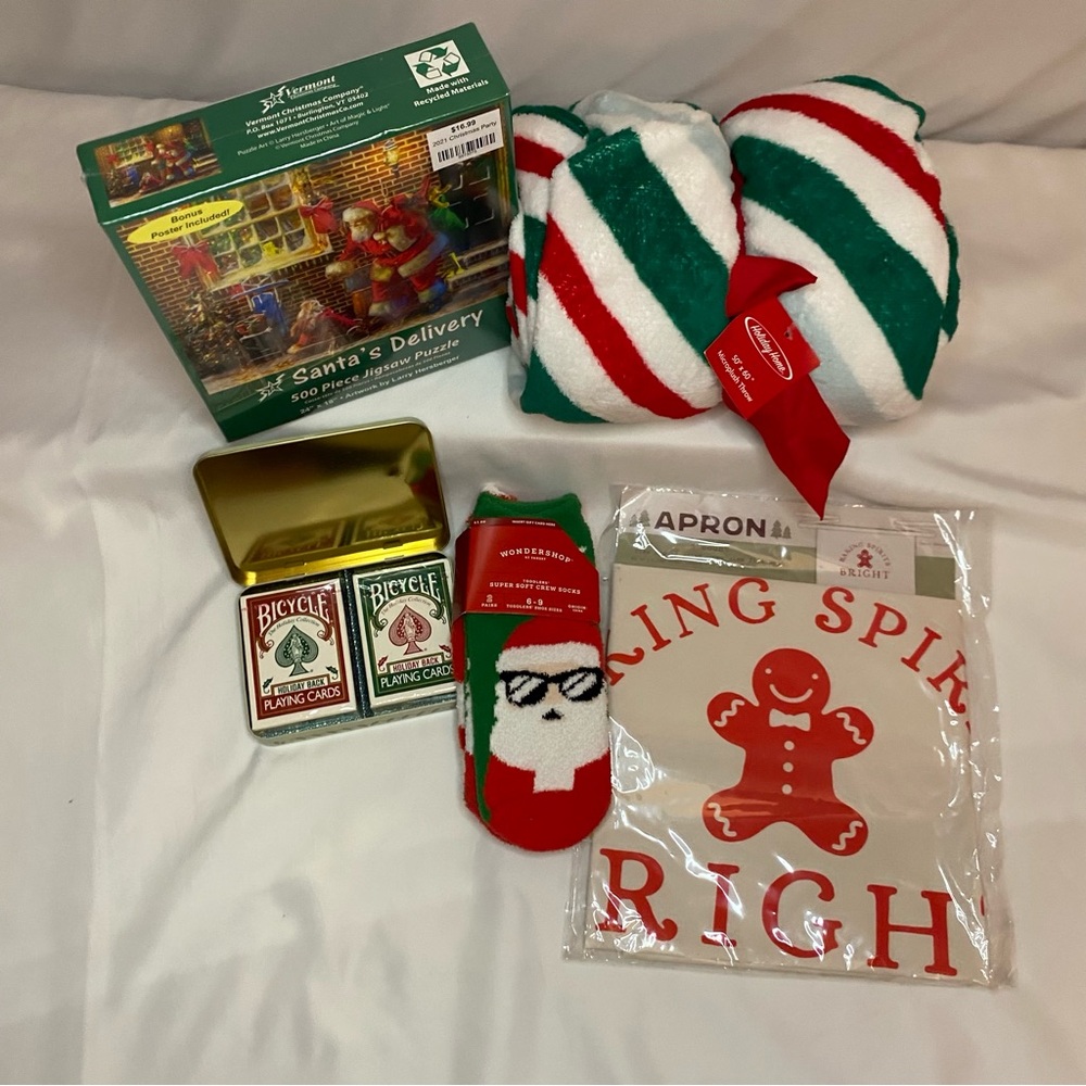 Christmas bundle. All items new with tags. Puzzle, blanket, socks, cards, apron